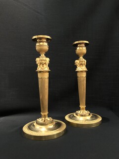  Pair of gilded chiseled bronze candlesticks from the Return from Egypt period